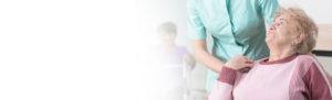 Picture of elderly lady getting care from a nurse