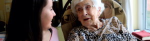 Photo of a senior with a volunteer
