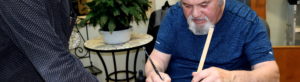 Photo of a senior doing craft